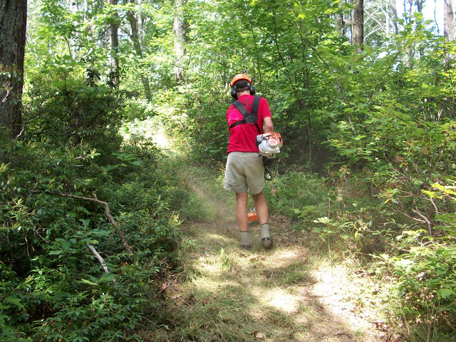 Matt Smith making 1 of 3 passes on Chestnut Ridge trail, opening up the view of the trail for maximum enjoyment of the Shenandoah Mountain 100 participants that were able to make it this far into the event.