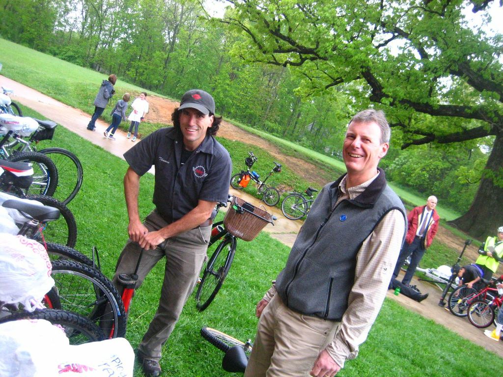 Thomas Jenkins and THMS teacher Jon DeVier-Scott pump tires at Bike to School Day 