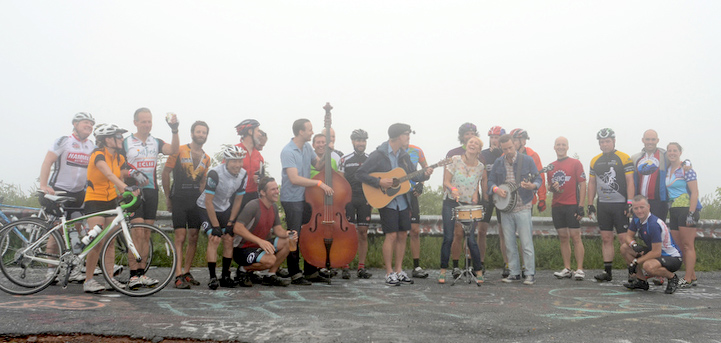 Bicyclists rode to Reddish Knob in thick fog as part of the festival on Saturday morning. Thousands attended the first ever Red Wing Roots Music Festival at Natural Chimneys park in Mount Solon on Saturday, July 13, 2013. Photo by Pat Jarrett
